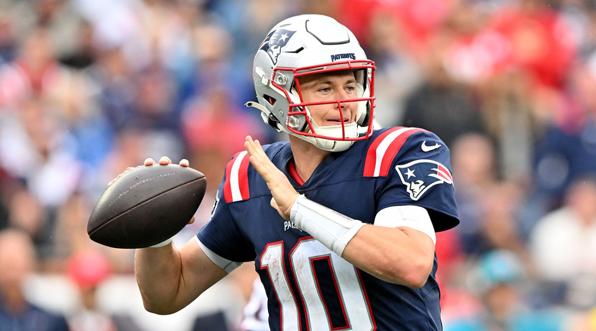 Mac Jones looking to make a pass with the Patriots.